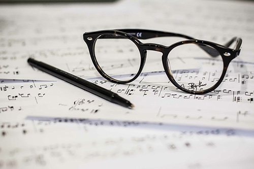 Sheet music and glasses